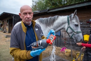 Horse trainer Peter Winks at his stable with some of contraptions that have been flown over his stables by drone. picture Shaun Colborn PD094551