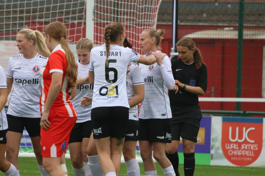 Brace: Jodie Snelson after scoring. Pictures: True Match Visuals.