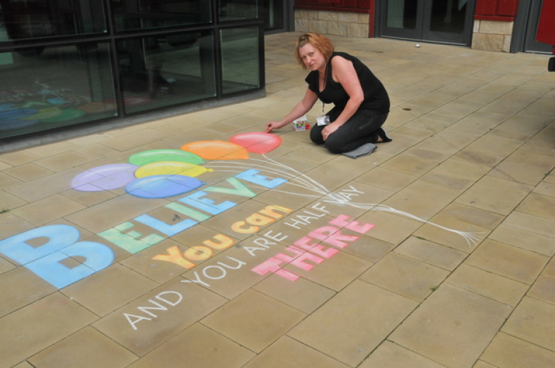 Main image for Street artist inspires college visitors