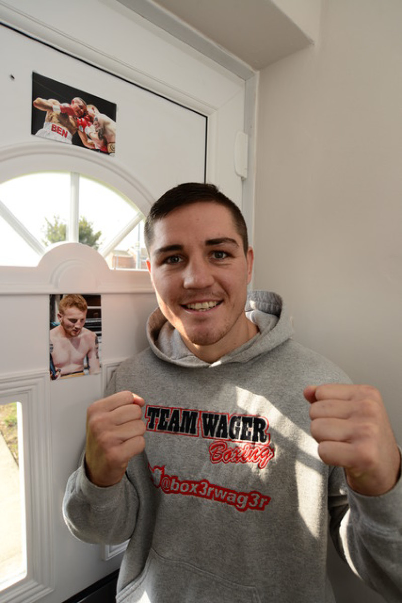Main image for Ben prepares for title challenge with pictures of rival pinned around his  house