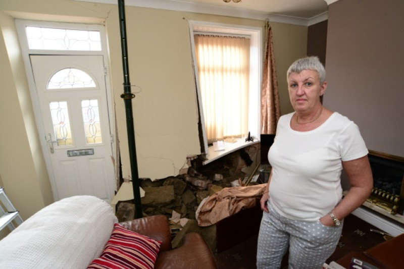 Main image for Car crashes into Old Mill Lane house