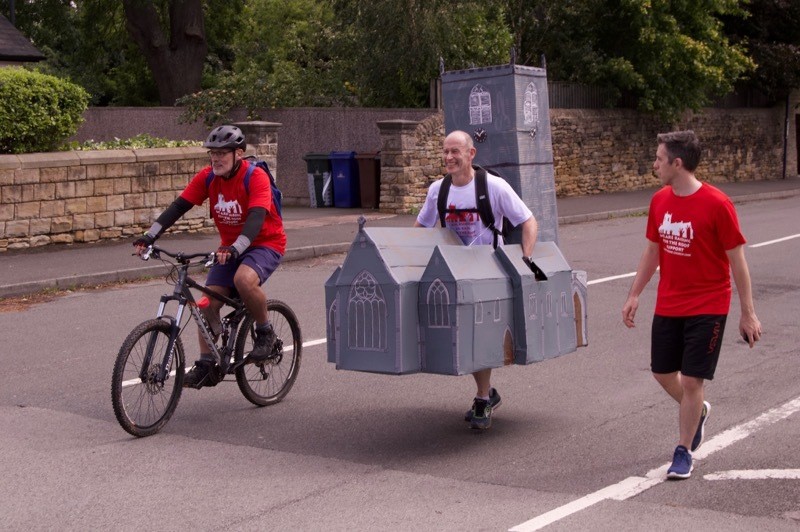 Main image for Stricken church’s roof benefits from parishioner’s run