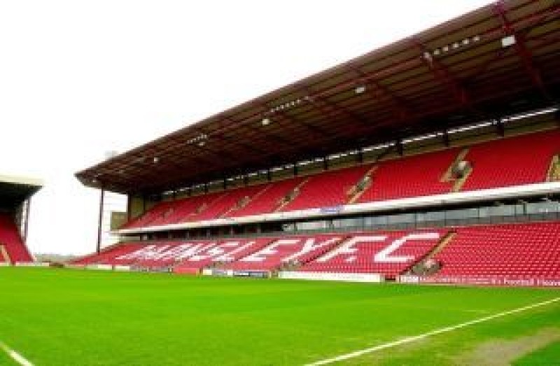 Main image for Football fans admit assault