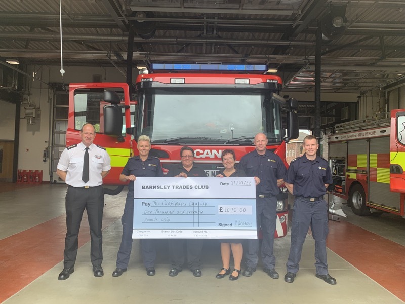 Main image for Club raise cash for fire-hit residents