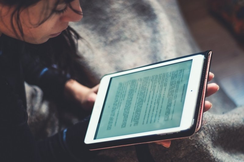 https://pixabay.com/photos/person-reading-tablet-people-1990906/