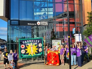 Strikers gathered outside the Barnsley College Sixth Form building on St Mary’s place