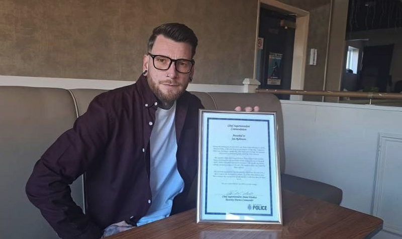Jon Robinson with his commendation.