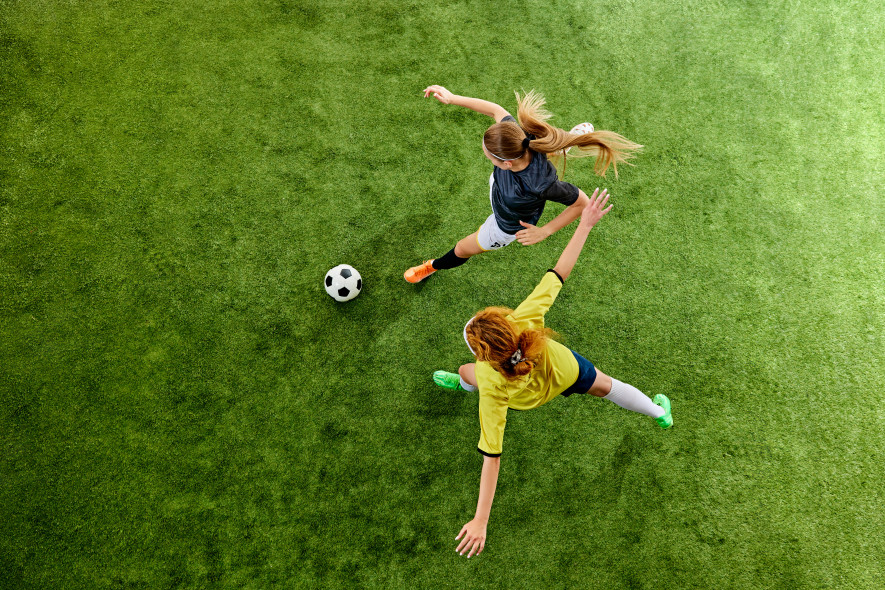 Ladies football, womens football, overhead shot of two tackling image 2 Stock Image
